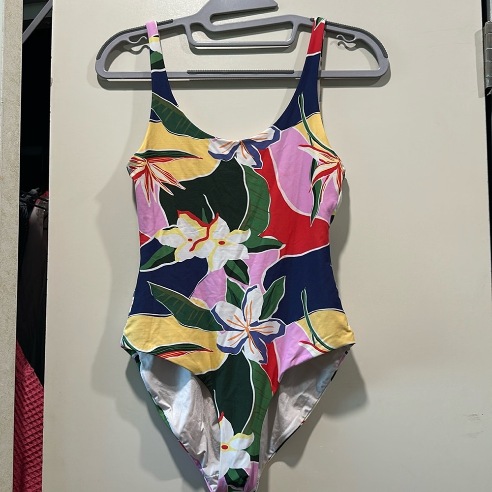Swimmer one piece with a side of extra back
